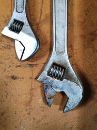 Close-up of spanner on table