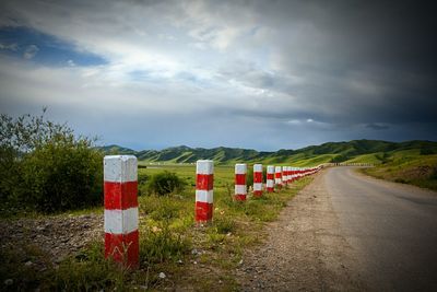 Empty road passing through landscape