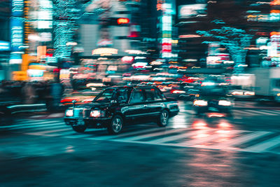 Traffic on city street at night