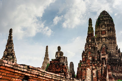 Low angle view of old building in ayutthaya province under the blue sky