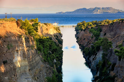 Panoramic view of bay against sky