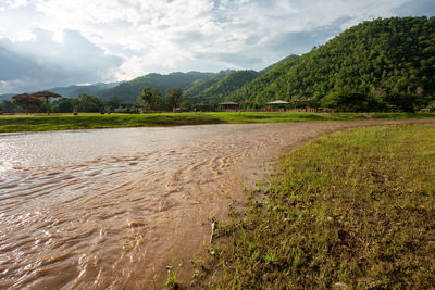 Scenic view of river against sky