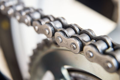 Close-up of chain on table