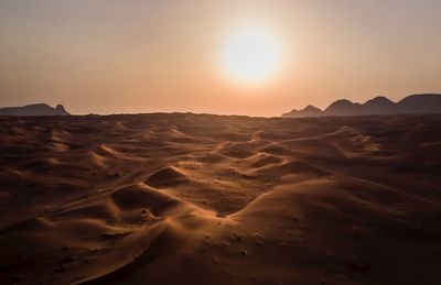 Scenic view of desert during sunset