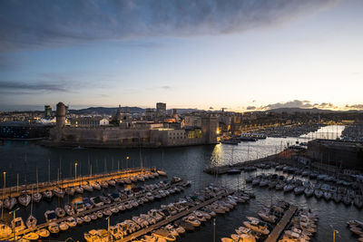 High angle view of river by city against sky