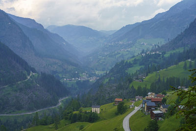 Scenic view of landscape and mountains against sky