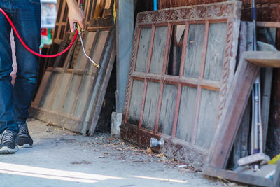 Low section of man standing at construction site