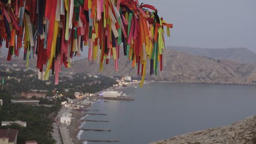 Colorful ribbons against beach