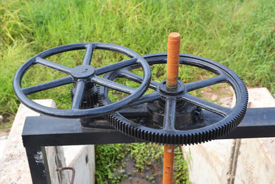 High angle view of bicycle wheel on field