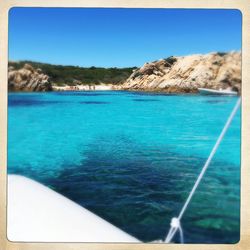 View of calm blue sea against clear sky