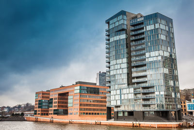 Low angle view of modern building against sky