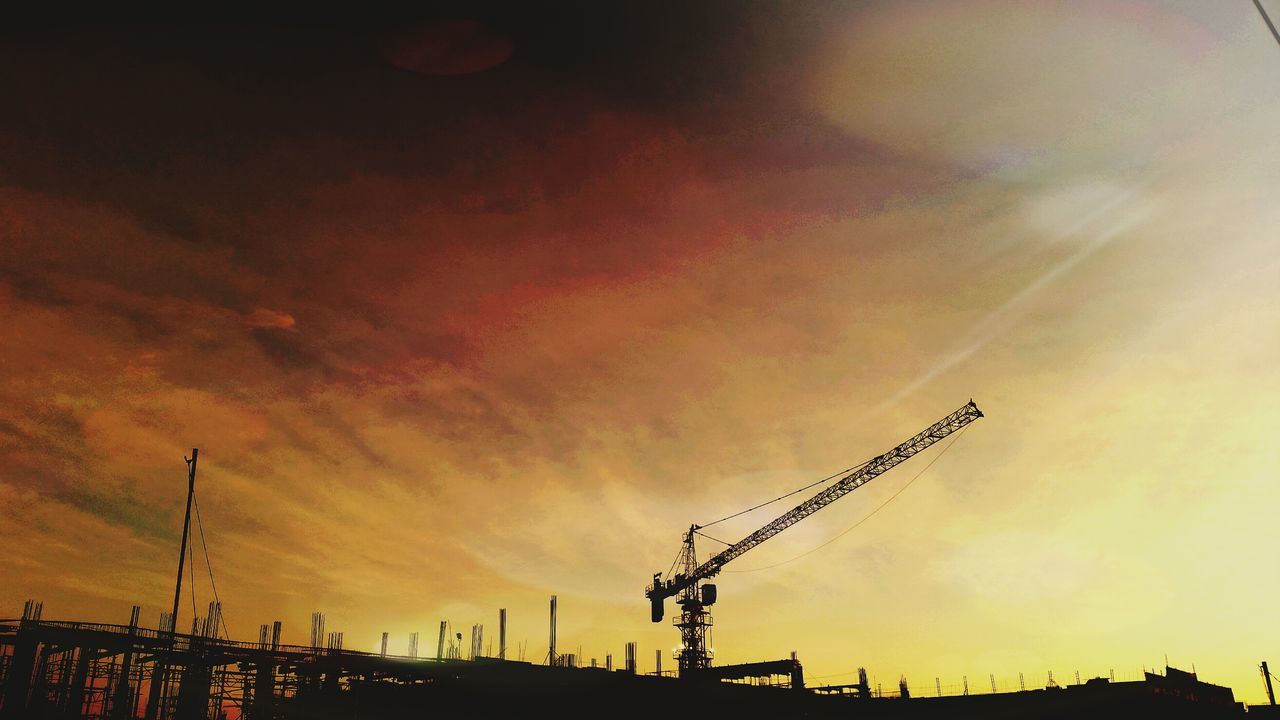 sunset, silhouette, sky, low angle view, orange color, cloud - sky, communication, dusk, nature, dramatic sky, outdoors, connection, no people, crane - construction machinery, cloudy, street light, beauty in nature, cloud, built structure, scenics