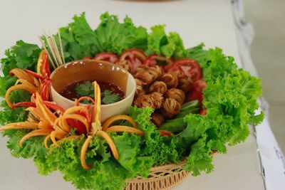 High angle view of vegetables in plate on table