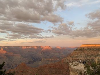 Scenic view of landscape against cloudy sky