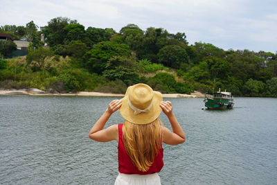 Holidays in south america. back view of tourist girl in vitoria, espirito santo, brazil.