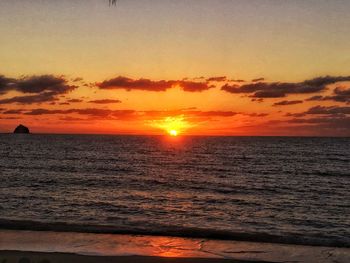 Scenic view of sea against sky during sunset