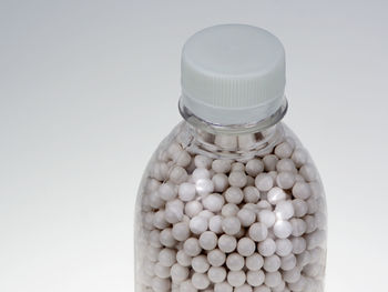 Close-up of white bottles