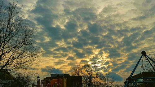 Low angle view of dramatic sky during sunset