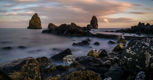 Scenic view of sea at sunset