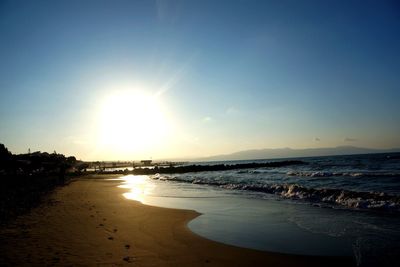 Scenic view of sea against sky at sunset