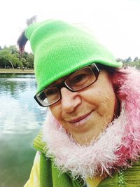 Portrait of smiling woman wearing hat