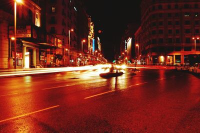 Light trails on city street at night