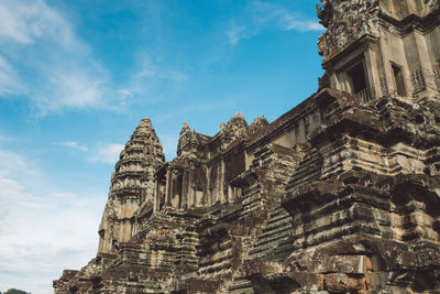 Low angle view of temple building against sky