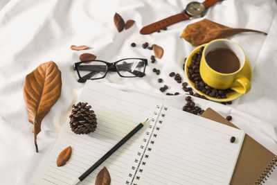 High angle view of coffee cup on table