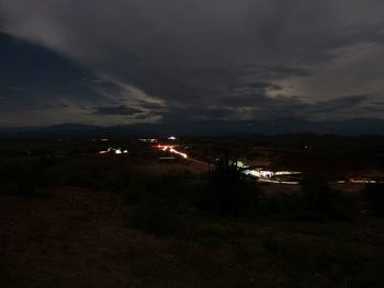 Scenic view of mountains against sky at dusk