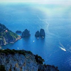 Scenic view of sea against blue sky