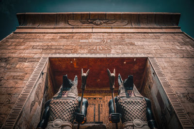 Low angle view of statues on building