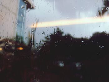 Full frame shot of wet window in rainy season