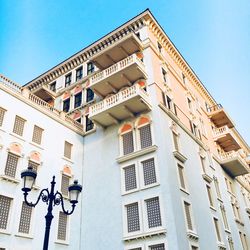 Low angle view of building against blue sky
