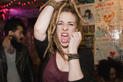 Young woman dancing at a club