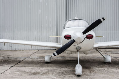 Close-up of airplane on airport runway