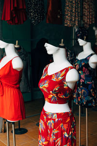 Dress displayed on mannequins for sale in store