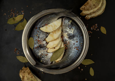 High angle view of fish in container on table