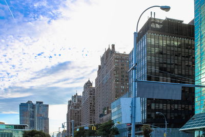 Low angle view of skyscrapers against sky