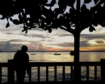 Scenic view of sea at sunset