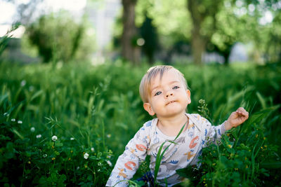 Portrait of cute baby girl at park