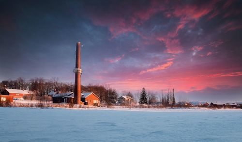 Scenic view of sea against sky at sunset