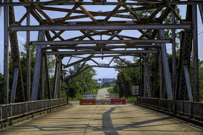 Footbridge over road in forest