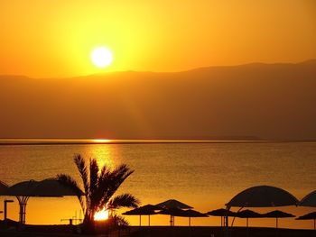 Scenic view of sunset over river