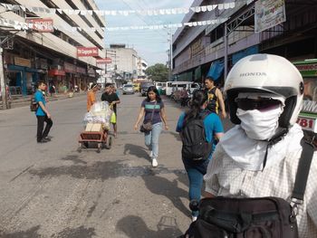 People on road against sky