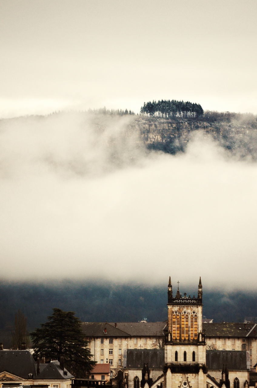 architecture, building exterior, built structure, building, sky, city, nature, no people, tree, fog, day, residential district, outdoors, travel destinations, high angle view, scenics - nature, cityscape, plant, the past, history