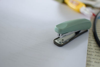 High angle view of smart phone on table