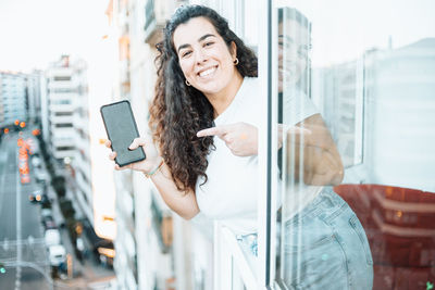 Young woman using mobile phone