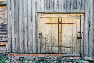 Close up old wooden door closed