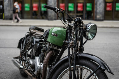 Bicycle parked on street in city