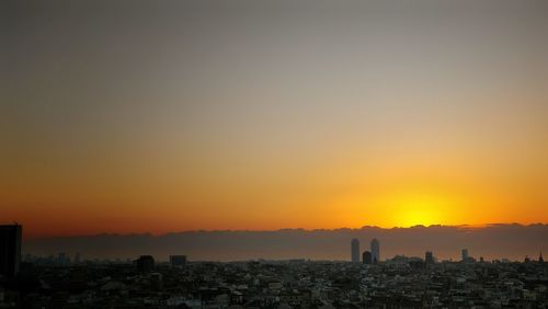 View of cityscape at sunset